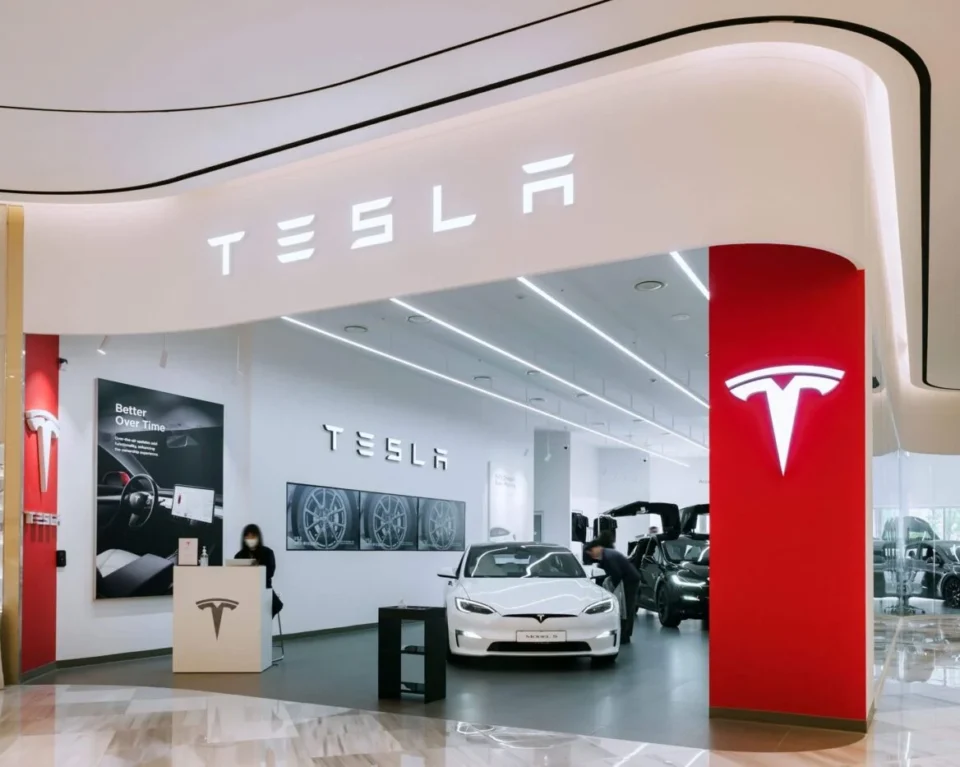 Tesla (TSLA) Stock Reclaims 52% EV Market Part as Ford and GM Retreat